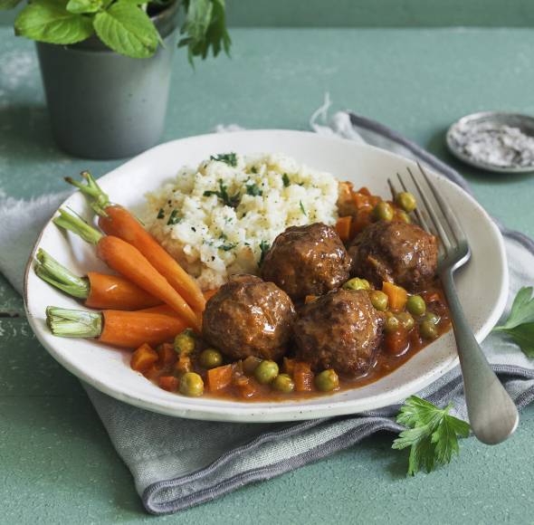 Wikingertopf mit Blumenkohlstampf und glasierten Möhren
